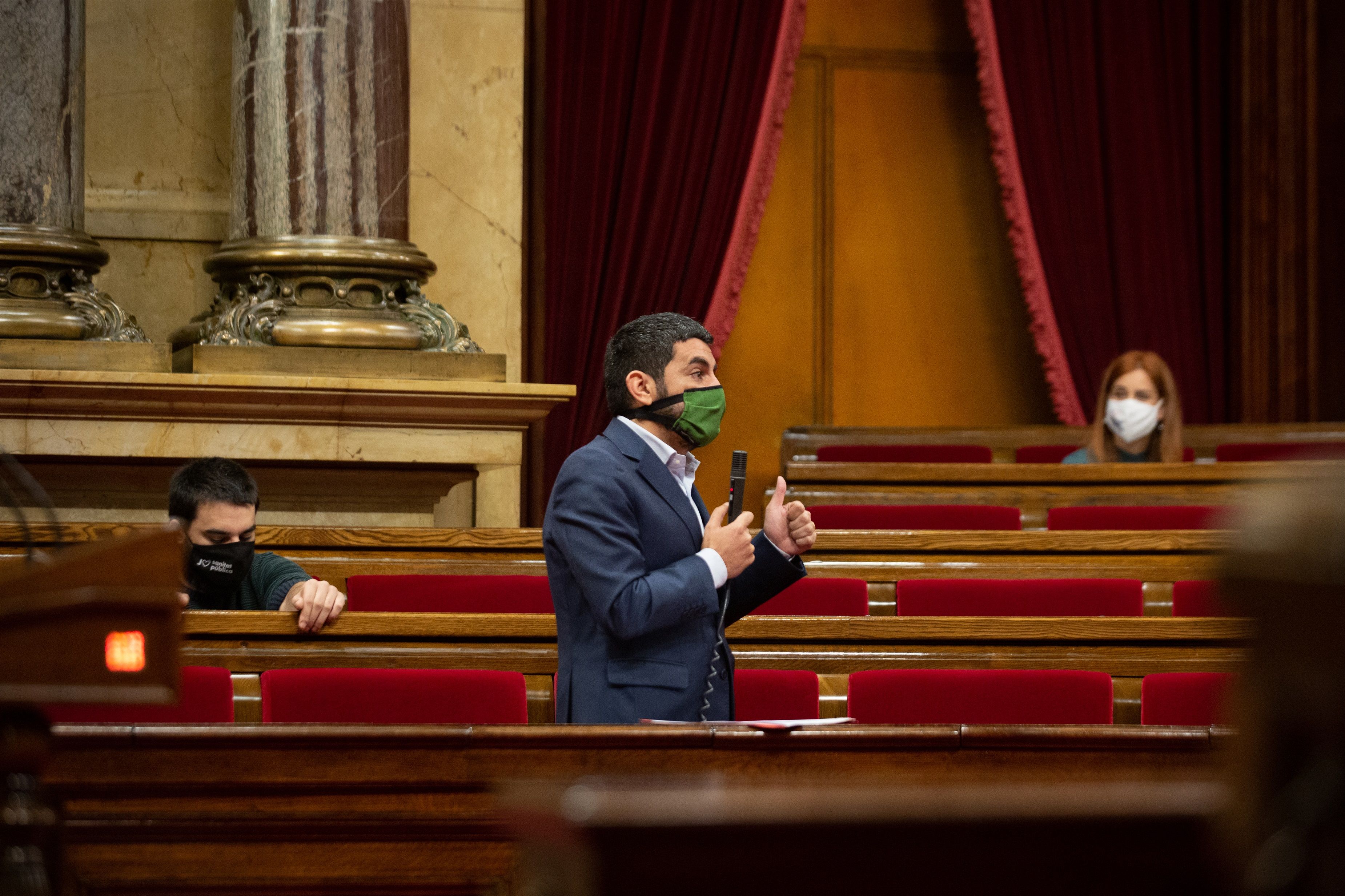 El consejero de Trabajo, Chakir el Homrani, durante el pleno del Parlamento | Europa Press