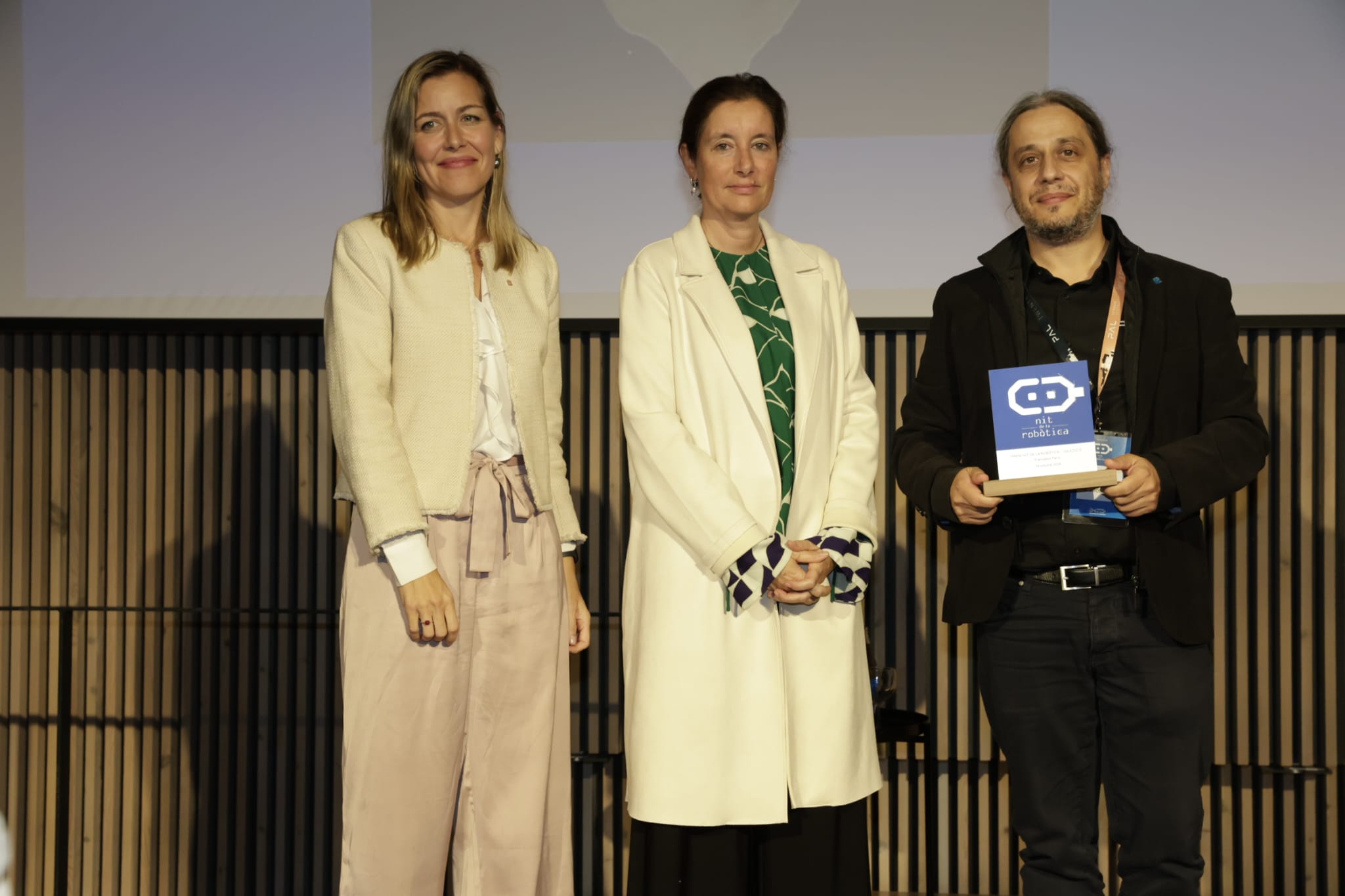 Maria Galindo (Polítiques Digitals de la Generalitat), Maria Salamero (Associació d'Enginyers Industrials de Catalunya) i Francesco Ferro (PAL Robotics) | Cedida