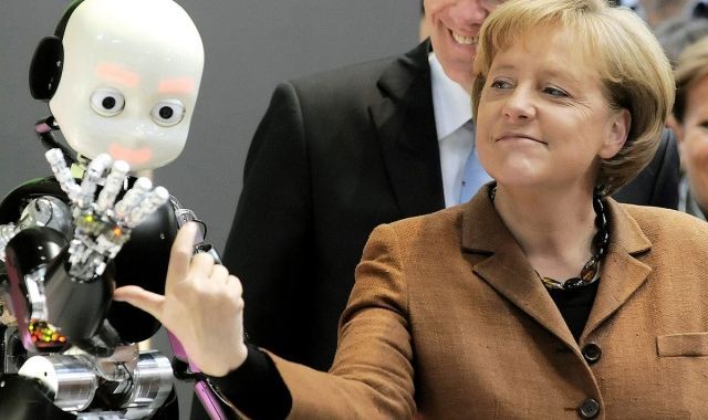 German chancellor Angela Merkel and a robot